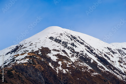 Snow On Mountain Peak