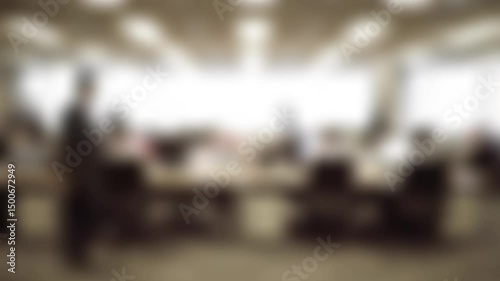 blurry scene DEFOCUESED BACKGROUND -People working in the busy office in a skyscraper