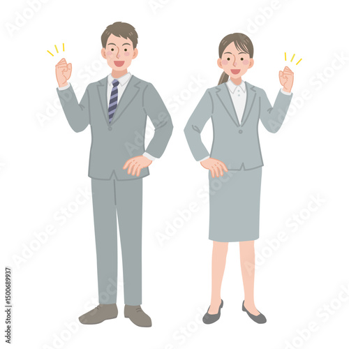 ガッツポーズをする会社員の男女