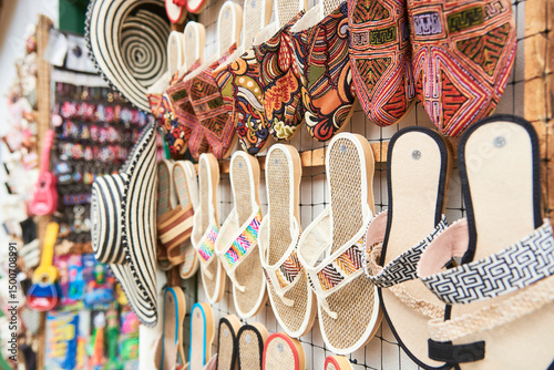 Handcrafted sandals and espadrilles for sale in a handicraft store that sells souvenirs for tourists in Paramo, Santander, Colombia.