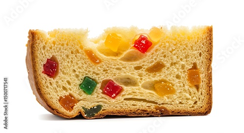 Fototapeta Naklejka Na Ścianę i Meble -  Close up of a slice of panettone bread with candied fruits on a white background