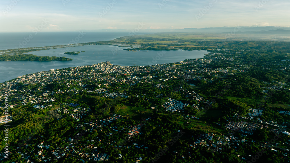 Fototapeta premium Mountain-Top Town Sunrise - Tropical Adventure