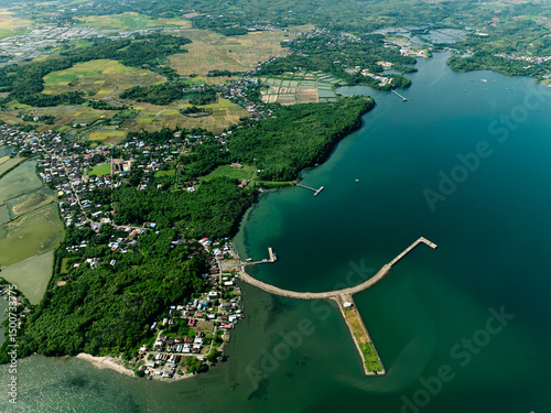 Fototapeta Naklejka Na Ścianę i Meble -  Tropical Coastal Hamlet Aerial Exploration