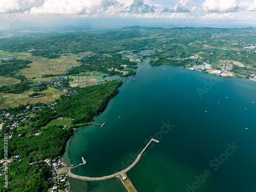 Fototapeta Naklejka Na Ścianę i Meble -  Serene Beach Town Aerial Perspective