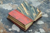 Antique book open on aged surface