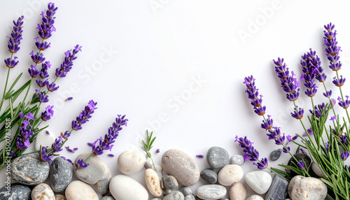 Lavender flowers with natural spa stones on white background for relaxation concept