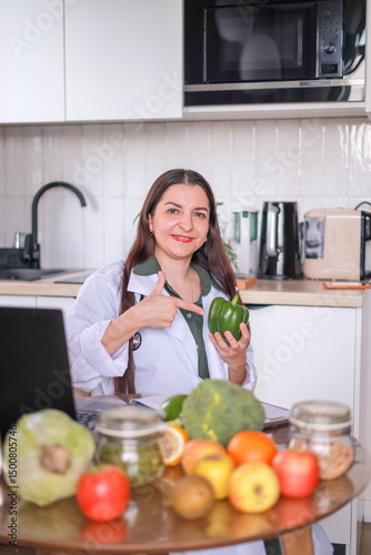 Green pepper in hands of Doctor nutritionist, health benefits of eating fresh vegetables. Diet, raw food, vitamins.