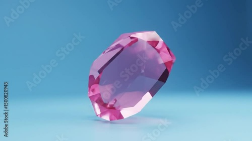 Rotating pink crystal gemstone on blue background