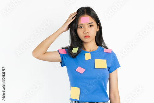 Stressed woman hand touch on head with suspicious thoughtful pondering on isolated background.