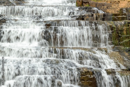 Cascading A Multi-Tiered Pongour Waterfall Displaying Natures Power and Beauty. Dalat, Vietnam. photo