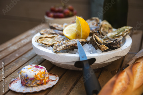Fresh Raw Oysters with Citron, Baguette, Butter, and Cider