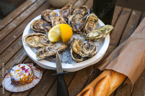 Fresh Raw Oysters with Citron, Baguette, Butter, and Cider