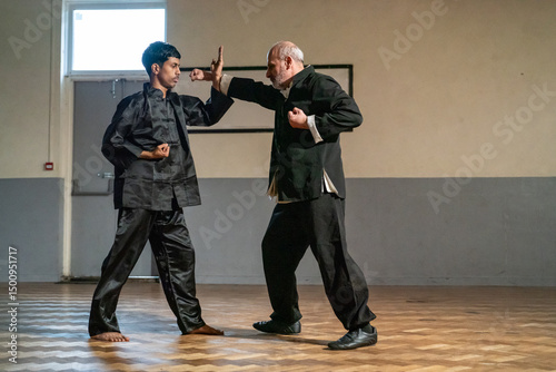 Man undergoing Kung Fu Black Belt test