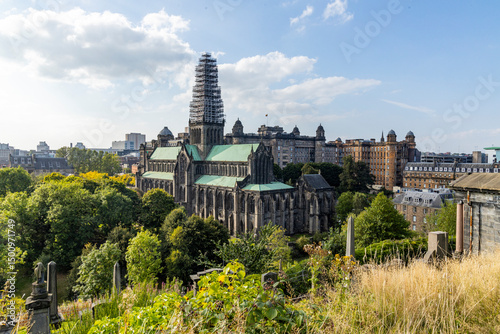 Glasgow cityscape in Scotland, where historic buildings meet modern architecture. The River Clyde flows through the heart of the city, crossed by iconic bridges and surrounded by vibrant urban life.