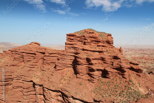 View of Pingshan Hu Grand Canyon is mainly composed of red gravel, sandstone, mudstone and is the only composite area of Danxia landform and colored hills in China photo
