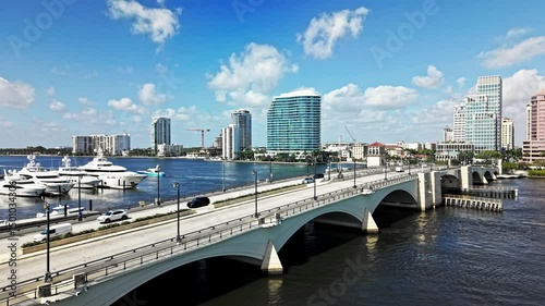 Pull out drone shot of Royal Park Bridge with One Flagler and Phillips Point building in West Palm Beach, Florida, USA