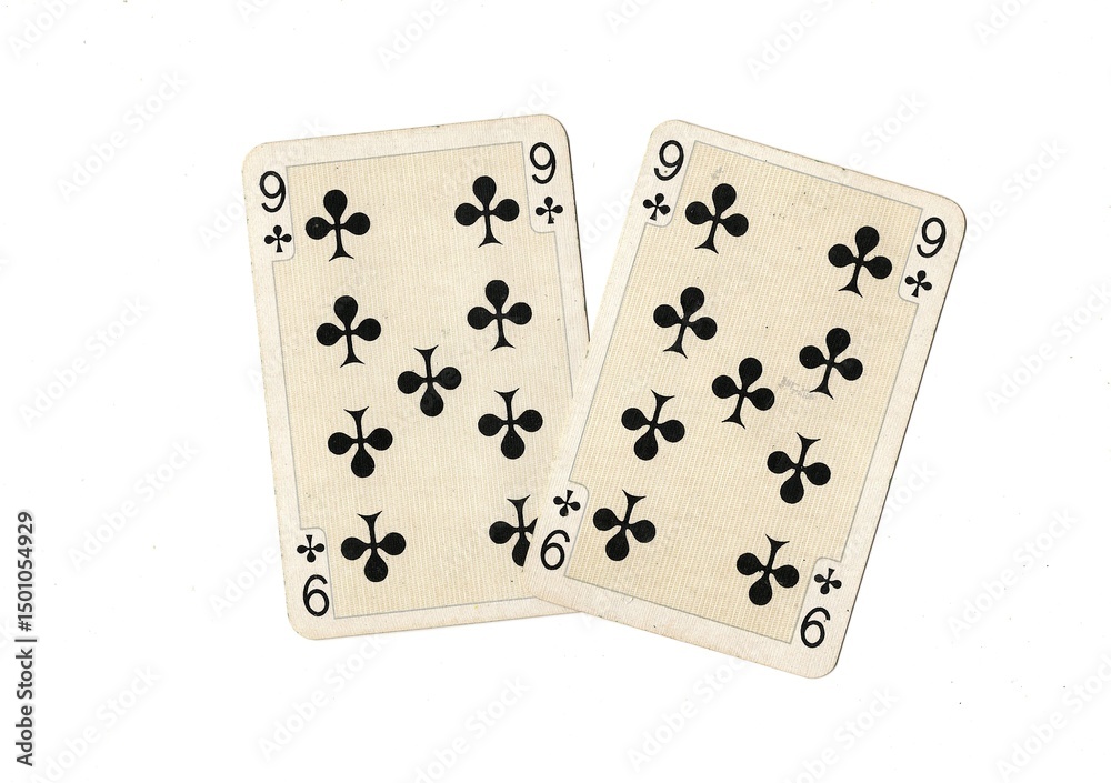 Obraz premium A pair of identical vintage playing cards isolated on a white background.