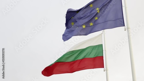 Bulgarian and European Union flags waving on the wind. Symbol of partnership, EU membership