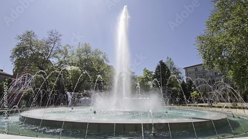 Grand Urban Fountain Spraying High Jets of Water in the center of Varna, Bulgaria. Refreshing Summer Landmark for Travel