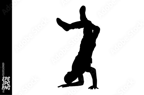 Dynamic Silhouette: A solitary breakdancer strikes a gravity-defying pose, silhouetted against a stark background. The image captures the dancer's agility and artistry.