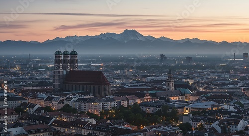 Twilight View of Munich Cityscape with the Alps in the Background
