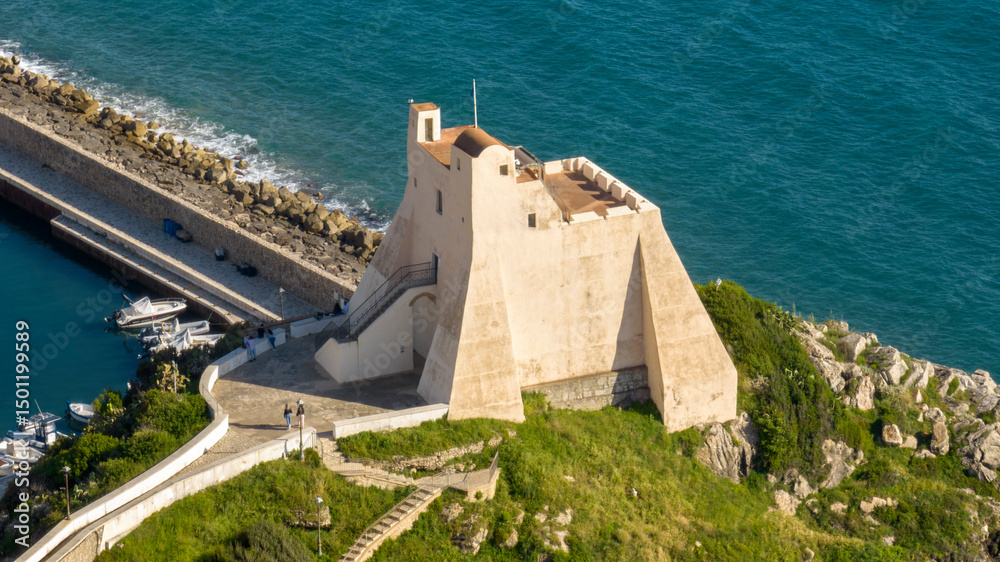 Fototapeta premium Aerial view of the tower on the Sperlonga seafront. This attraction is a symbol of the town in the province of Latina, Lazio, Italy.