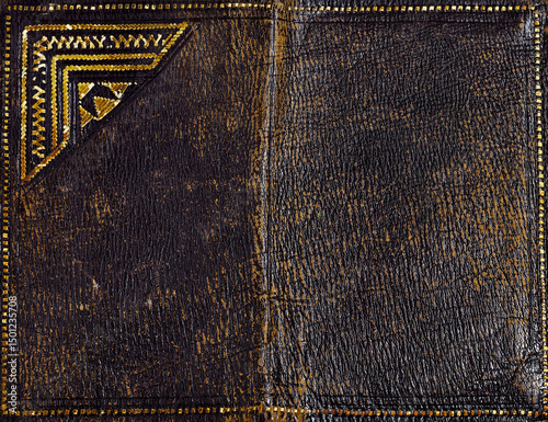 Vintage Leather Wallet with Intricate Design and Well-Worn Aesthetic Display