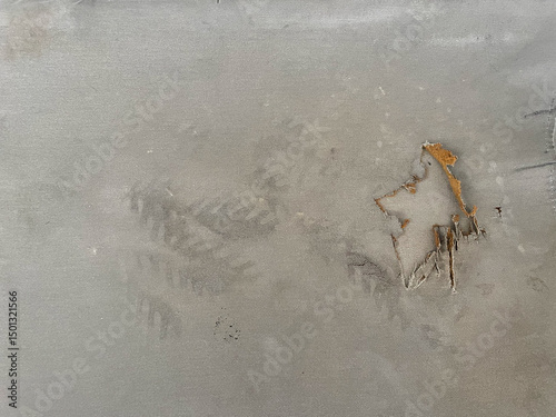 Hole of ripped gray jean fabric texture and background. photo