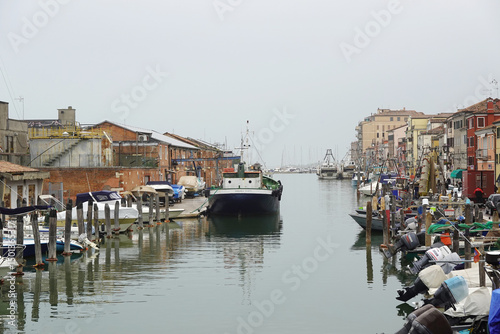 Fototapeta Naklejka Na Ścianę i Meble -  Old canals and streets in Chioggia, Italy           