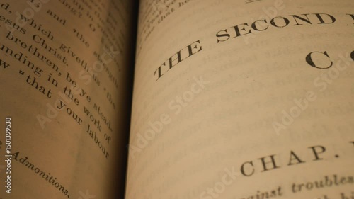 Video showcases books, focusing on pages about Corinthians and Paul