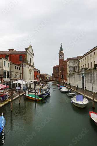 Fototapeta Naklejka Na Ścianę i Meble -  Old canals and streets in Chioggia, Italy