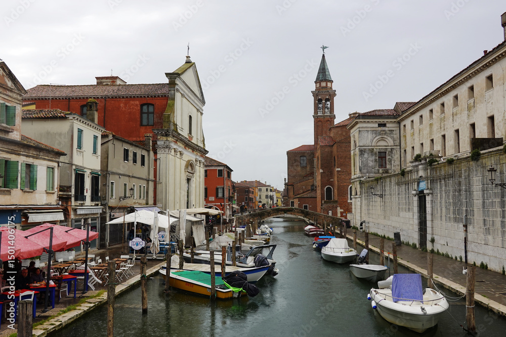 Fototapeta premium Old canals and streets in Chioggia, Italy