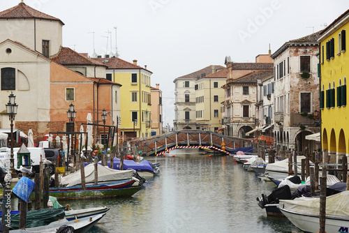 Fototapeta Naklejka Na Ścianę i Meble -  Old canals and streets in Chioggia, Italy	