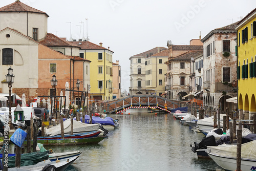 Fototapeta Naklejka Na Ścianę i Meble -  Old canals and streets in Chioggia, Italy	