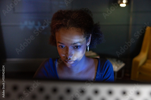 Intense Focus While Using a Computer at night