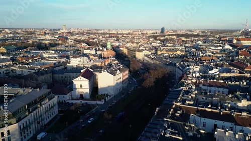 Wallpaper Mural Krakow, Poland: Aerial drone footage of the main avenue with tram line in the historic Kazimierz district of Krakow old town on a sunny winter day in Poland.  Torontodigital.ca