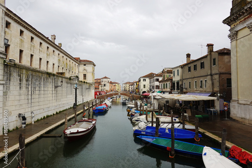 Fototapeta Naklejka Na Ścianę i Meble -  Old canals and streets in Chioggia, Italy	