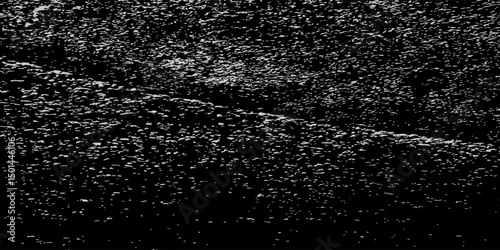 Distressed white grainy texture with dust overlay textured. Grainy noise particles and snow effect on a black background