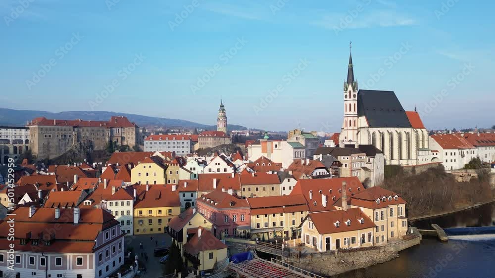 Cesky Krumlov, Czech Republic: Aerial drone footage of Cesky Krumlov old town main square and the St Vitus church in Bohemia in Czech Republic. Shot with a forward and up motion. 