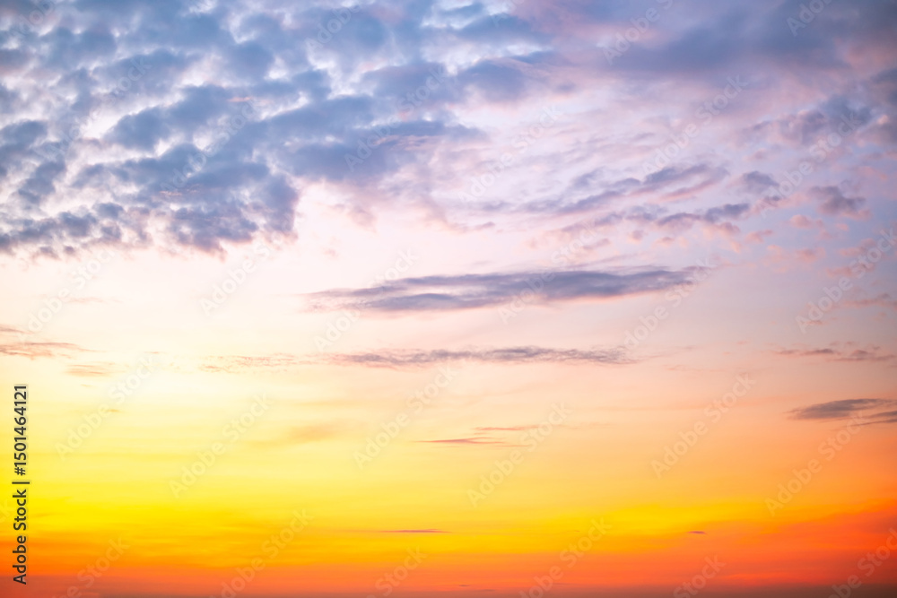 Fototapeta premium Beautiful , luxury soft gradient orange gold clouds and sunlight on the blue sky perfect for the background, take in evening,Twilight, Large size, high definition landscape photo