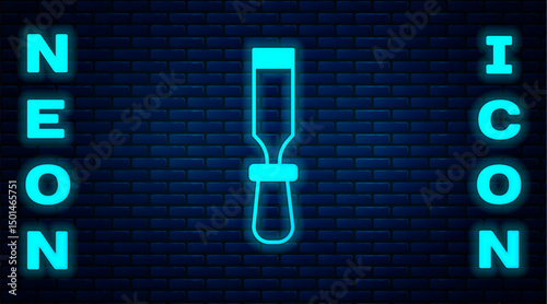 Glowing neon Chisel tool for wood icon isolated on brick wall background. Vector