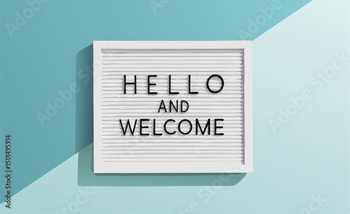 A cheerful greeting sign saying 'Hello and Welcome' on a turquoise background.