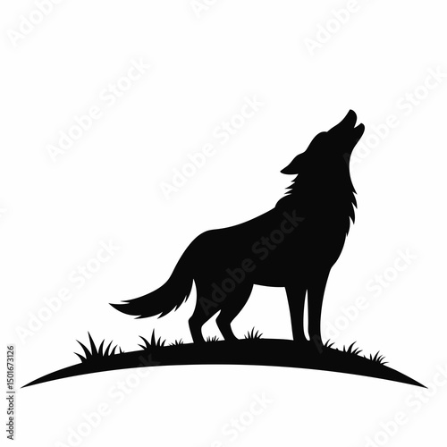 Silhouette of a howling wolf on a hill