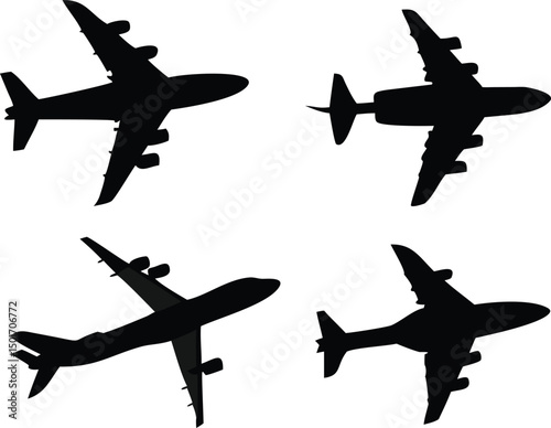 Set of Four Silhouettes of Cargo Planes in Different Aerial Poses