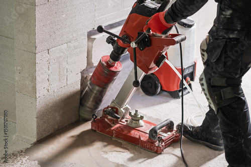 Core Drilling into Concrete Wall During Construction Work