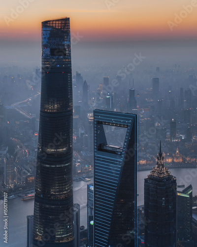 Aerial view of a breathtaking urban skyline with towering skyscrapers at sunset, Pudong, Shanghai, People's Republic of China.