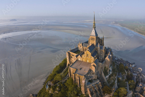 Aerial view of mont saint michel island with its historic church and picturesque landscape, normandy, france. photo