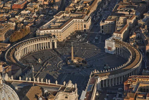 Aerial view of st. peter's square with the obelisk of nero and fountains, vatican, rome, italy.