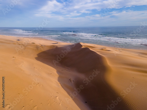Aerial view of Sardinia Bay beach with dunes and clear ocean water, Gqeberha, Eastern Cape, South Africa. photo
