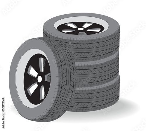 Stacked car tires ready for a change automotive transportation or seasonal tire replacement concept